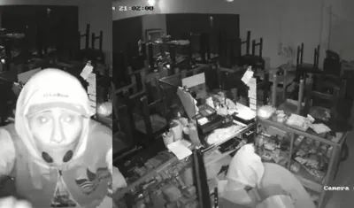 El ladrón robando en el restaurante. 