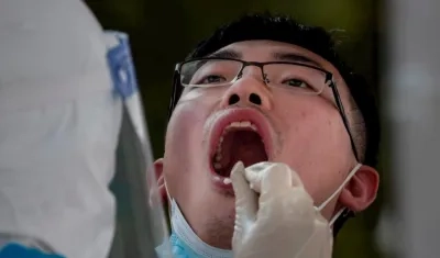 El número total de contagiados activos en la China continental asciende a 713.