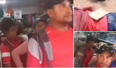 El niño y el joven son sacados con las manos amarradas por una mujer.