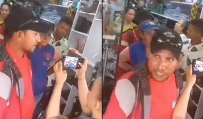 El niño y el joven (atrás) antes de ser asesinados.