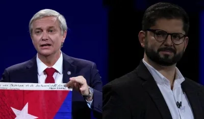 El ultraderechista José Antonio Kast y el diputado de izquierdas Gabriel Boric.