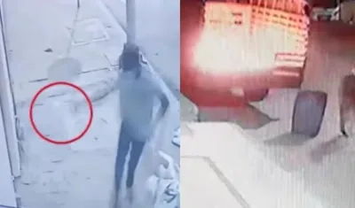 Los presuntos 'Costeños' disparando a negocios y prendiendo fuego a vehículos. 