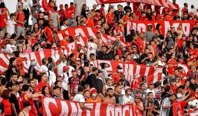 Hinchas del América. 