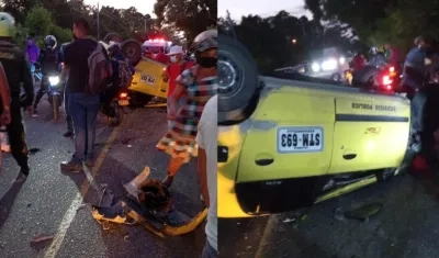 El taxi volcado tras el accidente. 