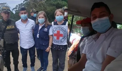 La comisión humanitaria con el patrullero Tomás Andrés Blanco.