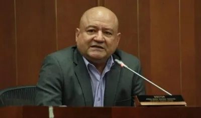 Carlos Lozada, partido Comunes.