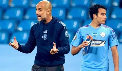 Pep Guardiola y Eric García.