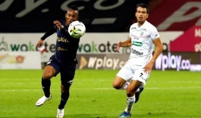 Acción del duelo entre el Deportivo Cali y el Once Caldas. 