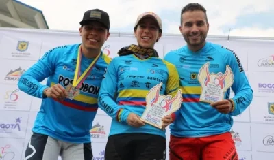 Carlos Mario Arboleda, Mariana Pajón y Carlos Ramírez. 