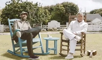 Juan Luis Guerra y Ricardo Montaner, cantantes.