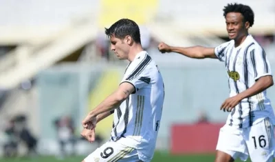 Álvaro Morata celebra su gol con Juan Guillermo Cuadrado. 