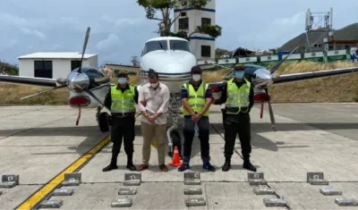 La cocaína incautada y los capturados.