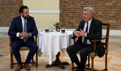 Director de Fronteras y jefe de la ACNUR, en coloquio.