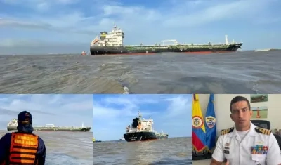 Ambar Bay es el buque varado por el tajamar oriental. A la derecha el Capitán del Puerto de Barranquilla.