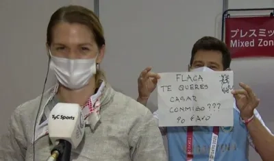 María Belén Pérez, sablista argentina, y su entrenador Lucas Saucedo.