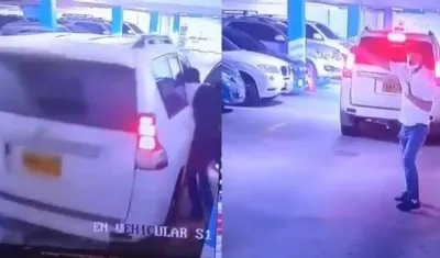 Momento del atraco en el parqueadero del hotel. 