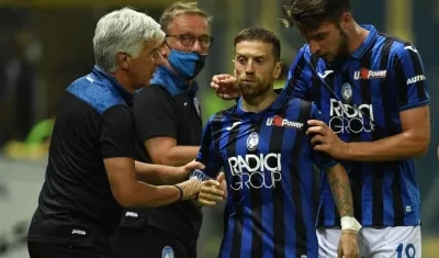 Gian Piero Gasperini y 'Papu' Gómez. 