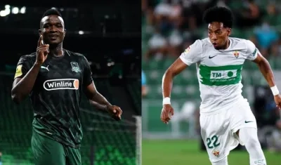 Jhon Córdoba y Johan Mojica. 