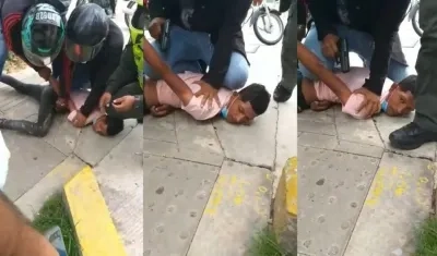 El sospechoso cuando era reducido por miembros de la Sijin. 