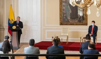 El presidente Iván Duque y el ministro de Justicia, Wilson Ruiz.