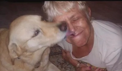 El perro y su dueña Suzan Marciano.