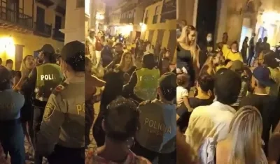 Momento de la riña entre la turista y la auxiliar de Policía. 