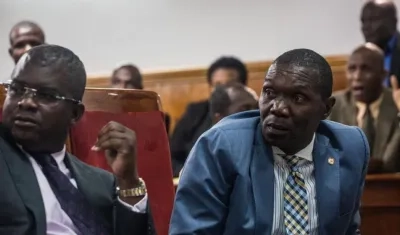 El presidente del Senado de Haití, Joseph Lambert (derecha).