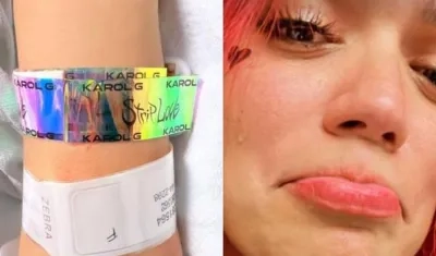 Brazo de la mujer que dio a luz y Karol G.