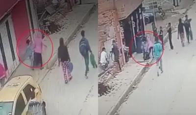 Momento que el niño y una adolescente llevaban la bolsa donde iba el bebé recién nacido. 