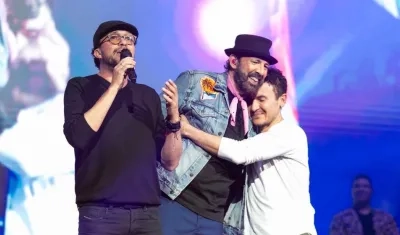 Juan Luis Guerra con Andrés Cepeda y Fonseca.