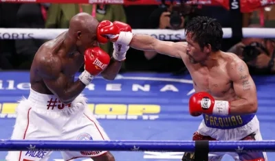 El filipino Manny Pacquiao (derecha).