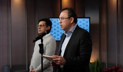 El Ministro del Interior y el Comisionado de Paz.