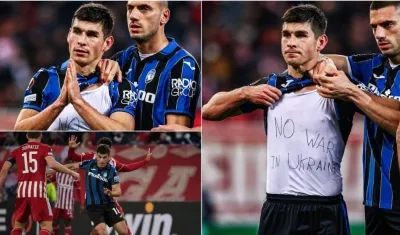 Malinovsky hace el llamado a la paz con un mensaje debajo de su camiseta. 