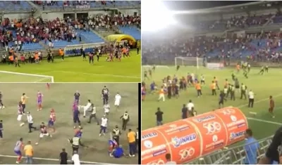 Momentos de la trifulca entre hincha y jugadores. 