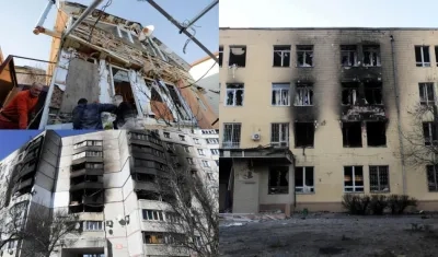 Varias personas tratan de arreglar los daños de varios proyectiles en una zona residencial de Odesa (Ucrania). 