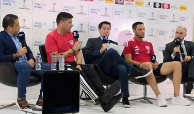 El técnico Juan Cruz Real y Sebastián Viera.