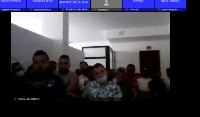 Los capturados durante la audiencia virtual de formulación de cargos. 