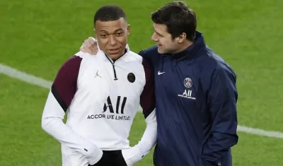 Kylian Mbappé y  Mauricio Pochettino.