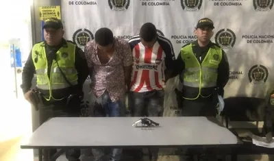 Los dos capturados en la URI de la Fiscalía. 