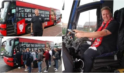Simon Wilson y el bus donde llevó a los hinchas. 