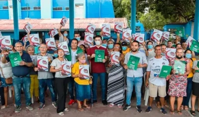 Familias beneficiadas con los títulos de propiedad. 