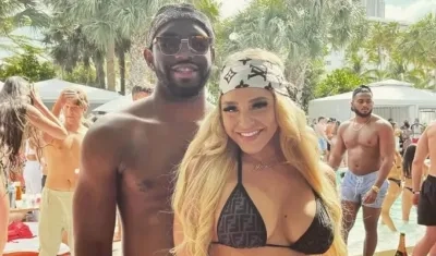 Courtney Clenney junto a su novio Christian Toby Obumseli