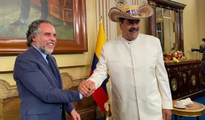 Armando Benedetti y Nicolás Maduro.