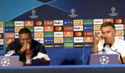 Kilyan Mbappé y el técnico Christophe Galtier.