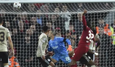 Joel Matip anota el gol de la victoria. 