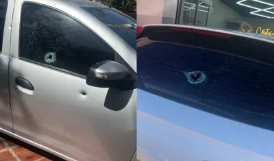 Varios vehículos impactados durante la balacera. 