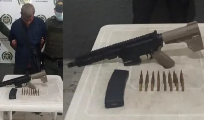 Brayan José Orozco Caraballo y el fusil.
