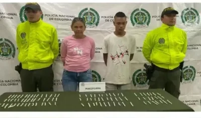 Los dos primos capturados en el allanamiento. 