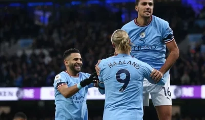 Rodrigo celebra su gol con Haaland.