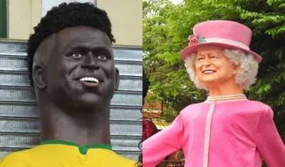 Muñecos gigantes de 'O Rei' Pelé y la reina Isabel II.